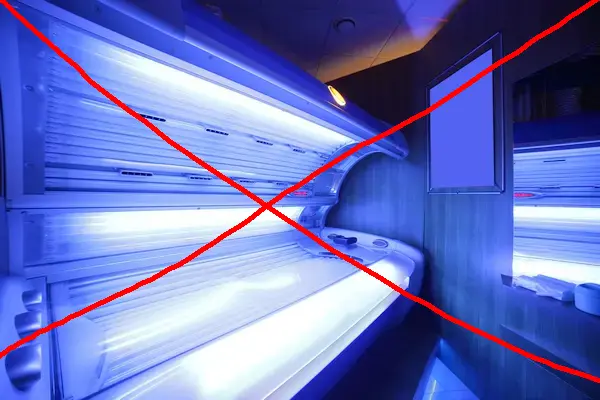 Niet onder de zonnebank
